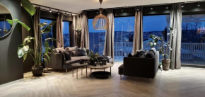 Modern villa in Tromsø, located between The Arctic Cathedral and The Cable Car